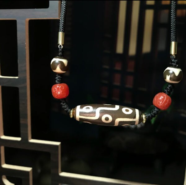 Ancient Wisdom Dzi Bead Necklace with Red Agate Accents - Image 2